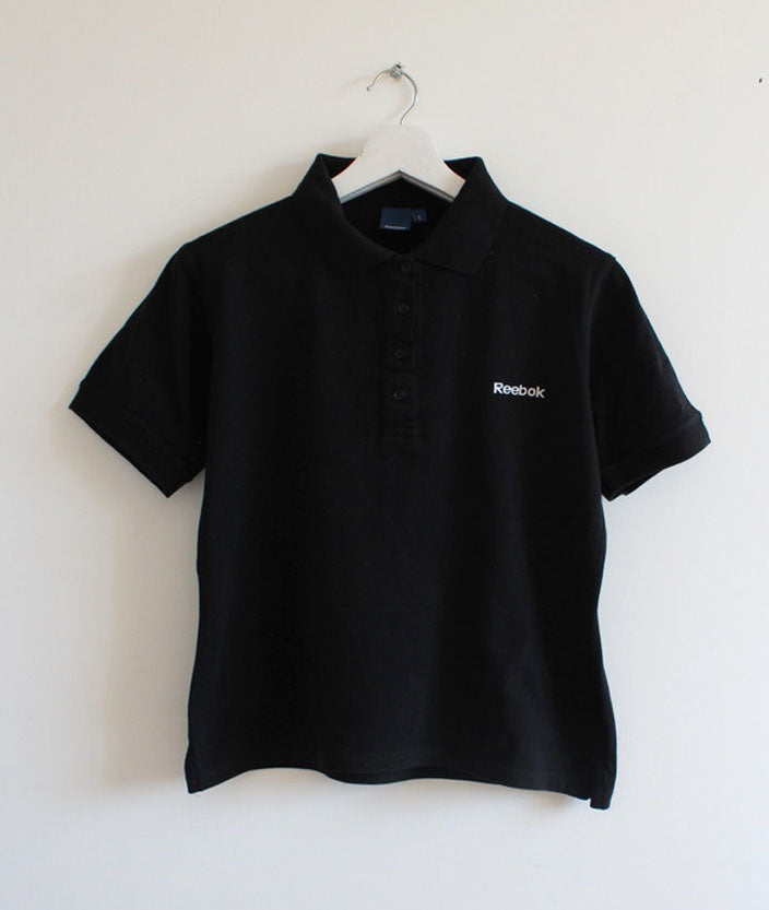 POLO FEMME REEBOK NOIR M